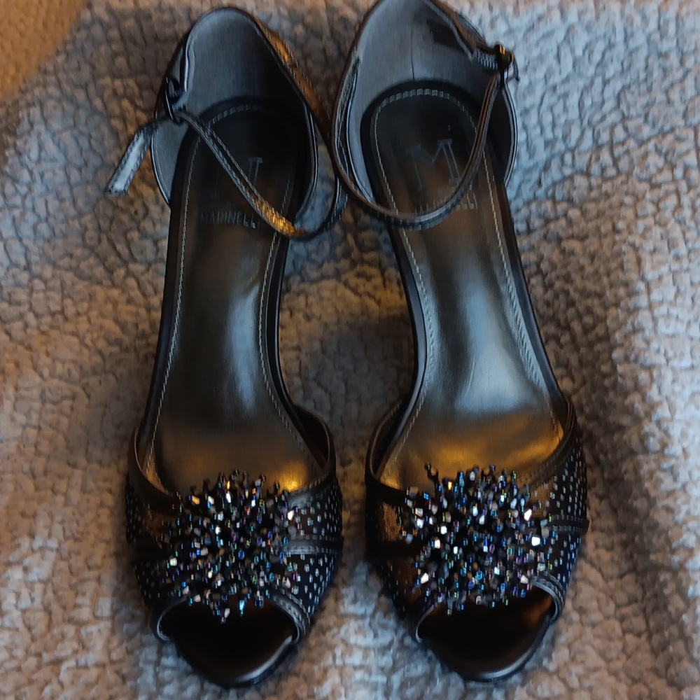 Size 7.5 pewter heels.  3" high.